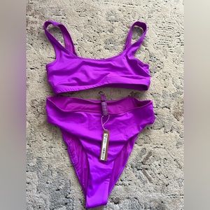 Skims swim set in violet.